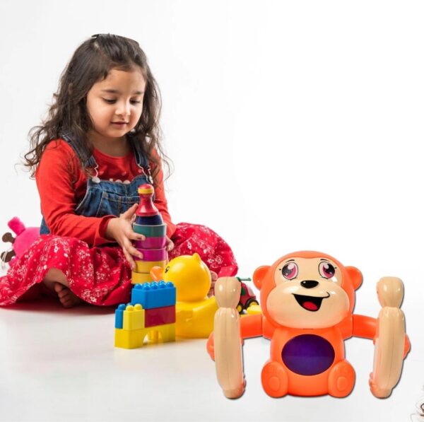 NAUGHTY 360 DEGREE ROTATION DANCING AND SPINNING ROLLING DOLL TUMBLE MONKEY TOY( MULTI COLOR - With Cell ) - Image 3